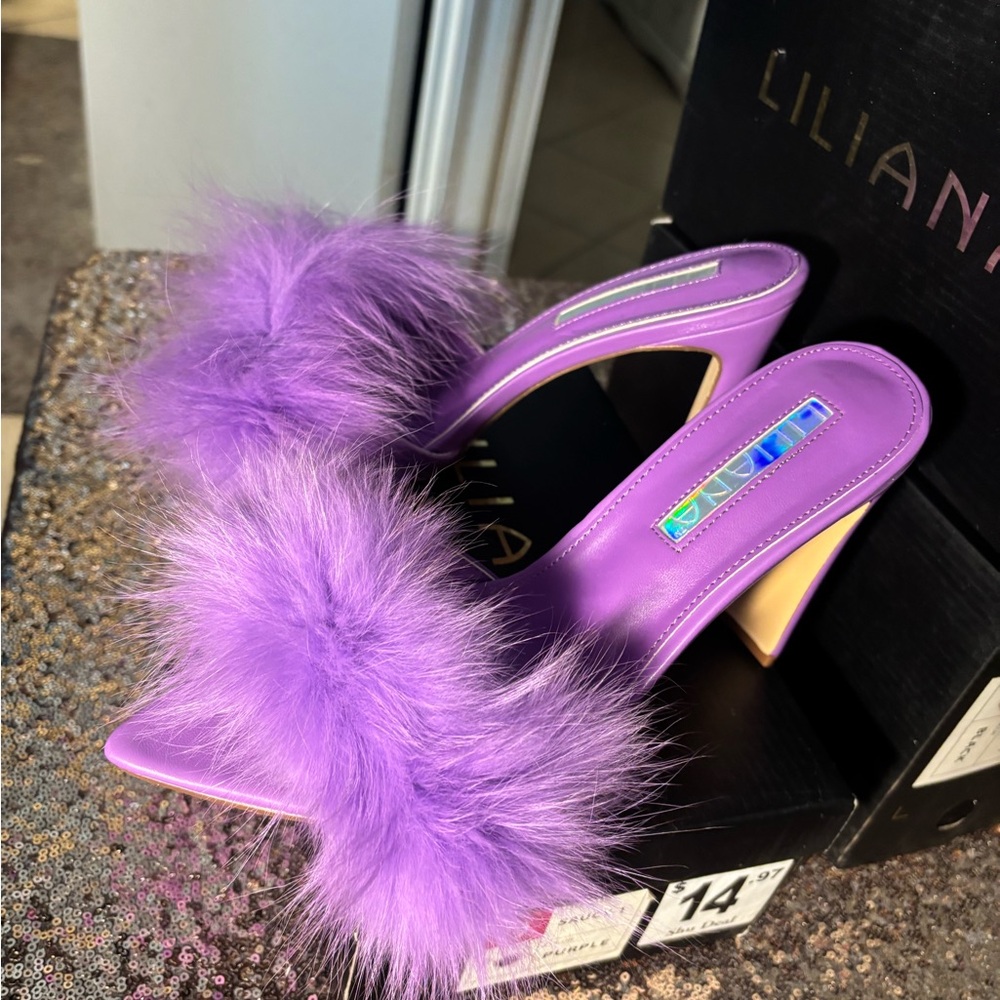 Purple fluffy pumps